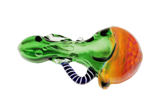 The Honeycomb Spoon Pipe is a hand-blown piece of art made of thick glass in vibrant colors. It measures approximately 4" in length, though it may vary slightly.
