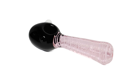 This 5" pink and black premium glass hand pipe is a collectible classic. It's made of handcrafted glass and features an art spiral design.