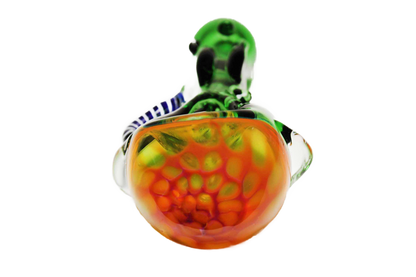 The Honeycomb Spoon Pipe is a hand-blown piece of art made of thick glass in vibrant colors. It measures approximately 4" in length, though it may vary slightly.
