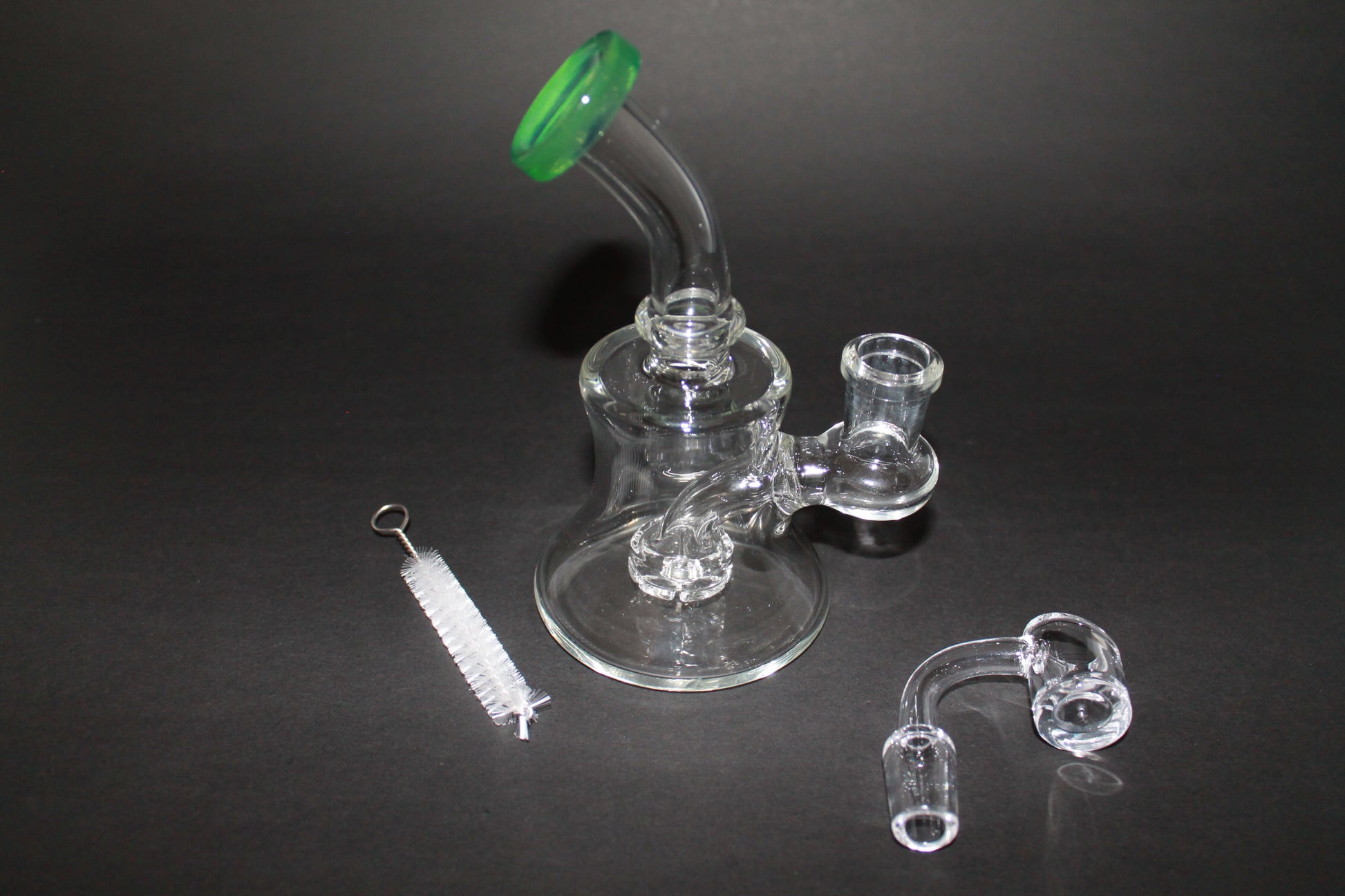 1 Dab Rig  1 Piece Quartz Banger  1 Piece Cleaning Brush